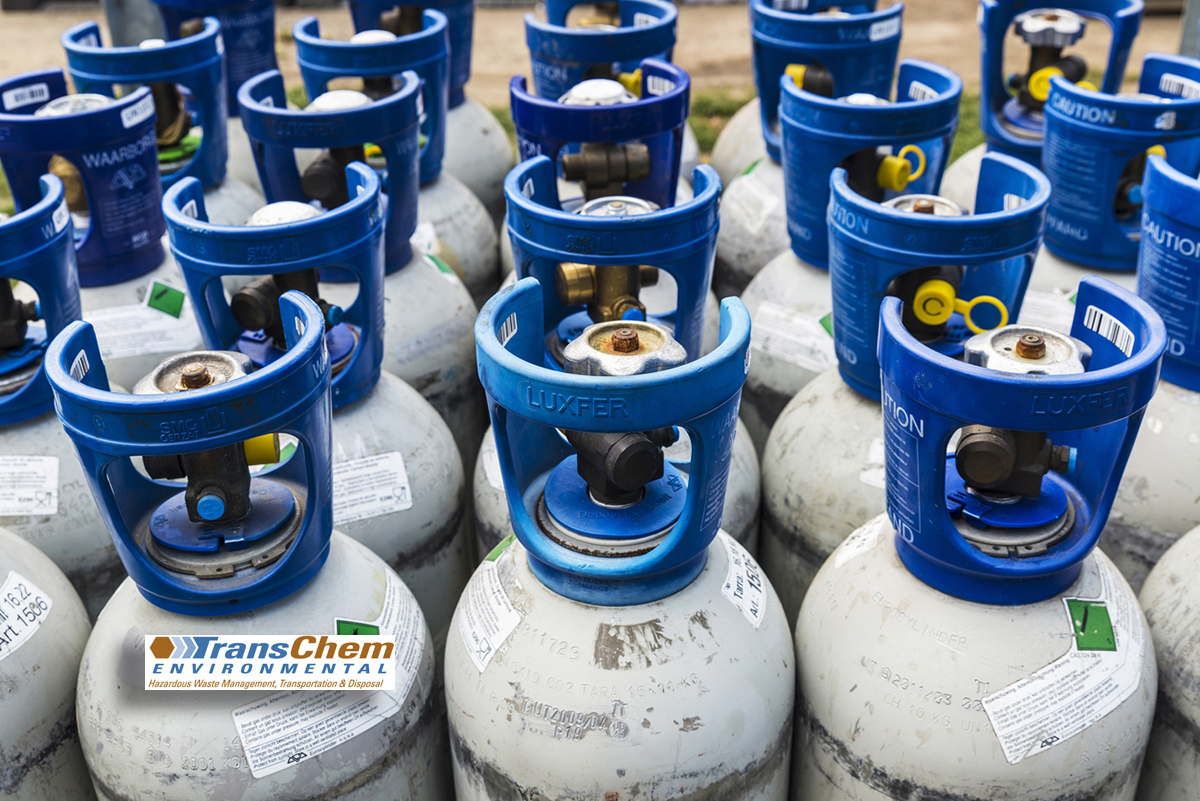Refrigerant canisters waiting for refrigerant disposal.